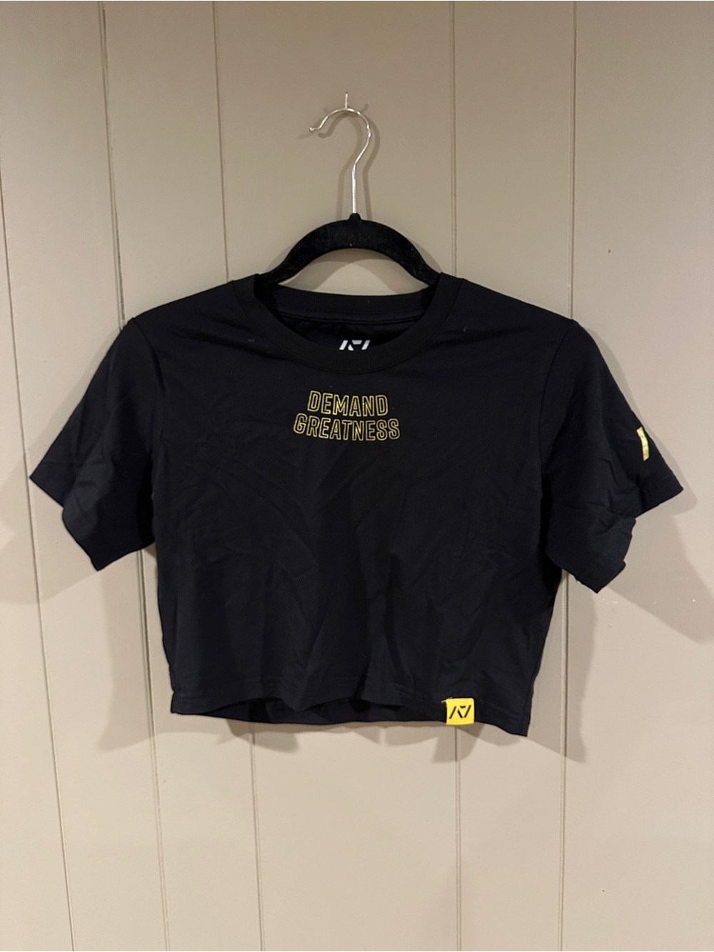 A7 Powerlifting Black Crop Tee with Yellow "Demand Greatness" Print